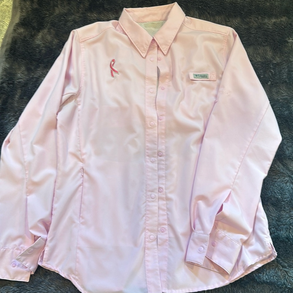 Columbia pink fishing shirt. Breast cancer awareness symbol on right breast